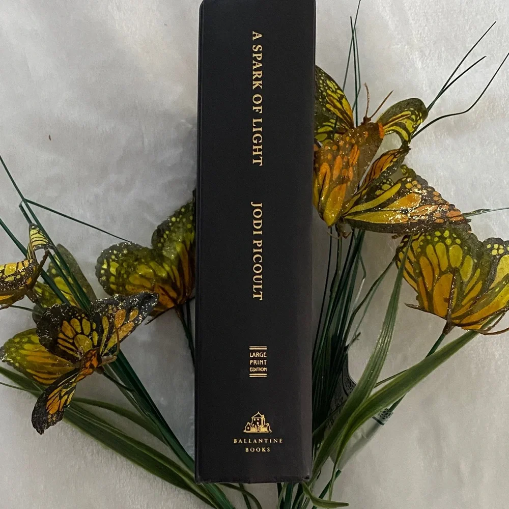BALLANTINE BOOKS A Spark of Ligt Book Large Print Edition.